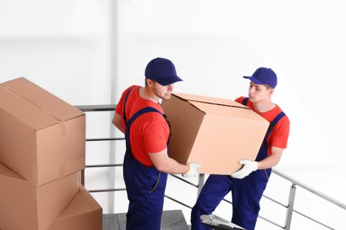 Boxes and office furniture prepared for commercial relocation