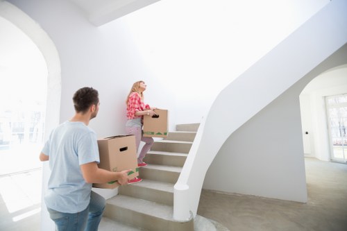Careful packing of fragile items with protective materials in Northlondon