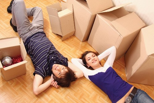 Professional moving team handling furniture delivery in North London